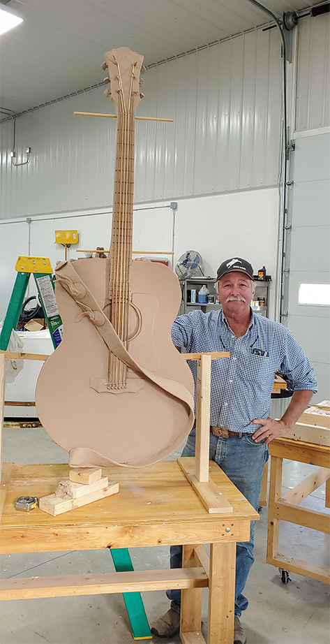 D. Michael Thomas with the Just LeDoux It guitar detail