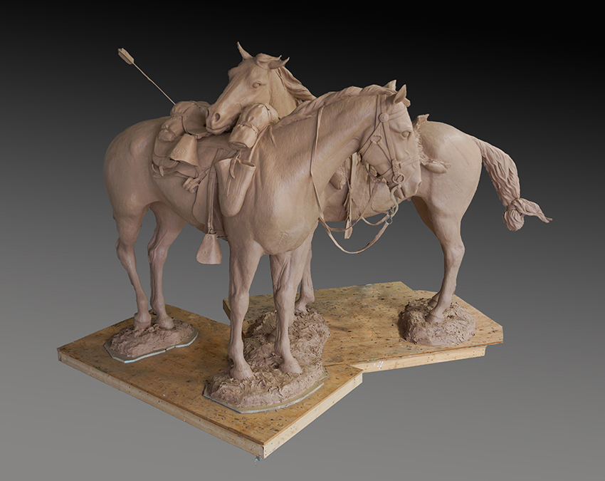 The work in clay, with the artist