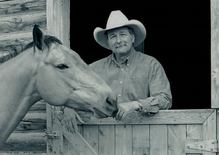 D. Michael Thomas with a horse